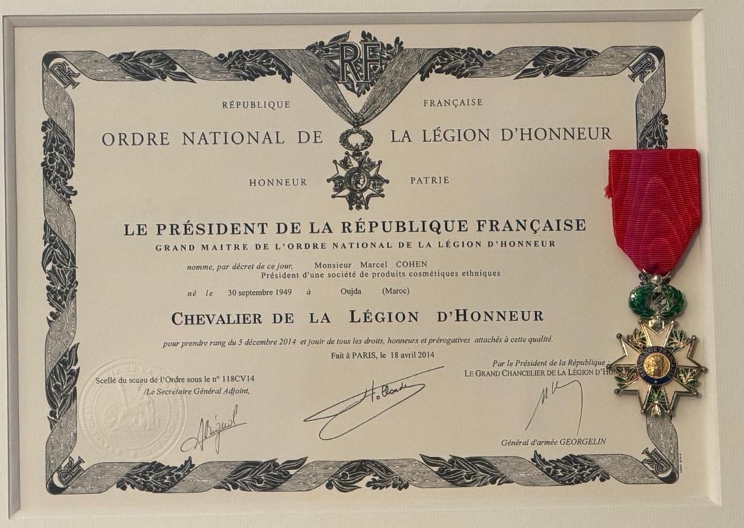 The letters patent of Chevalier de la Légion d'Honneur, signed in Paris on 18 April 2014, with the insignia — taking rank from 5 December 2014